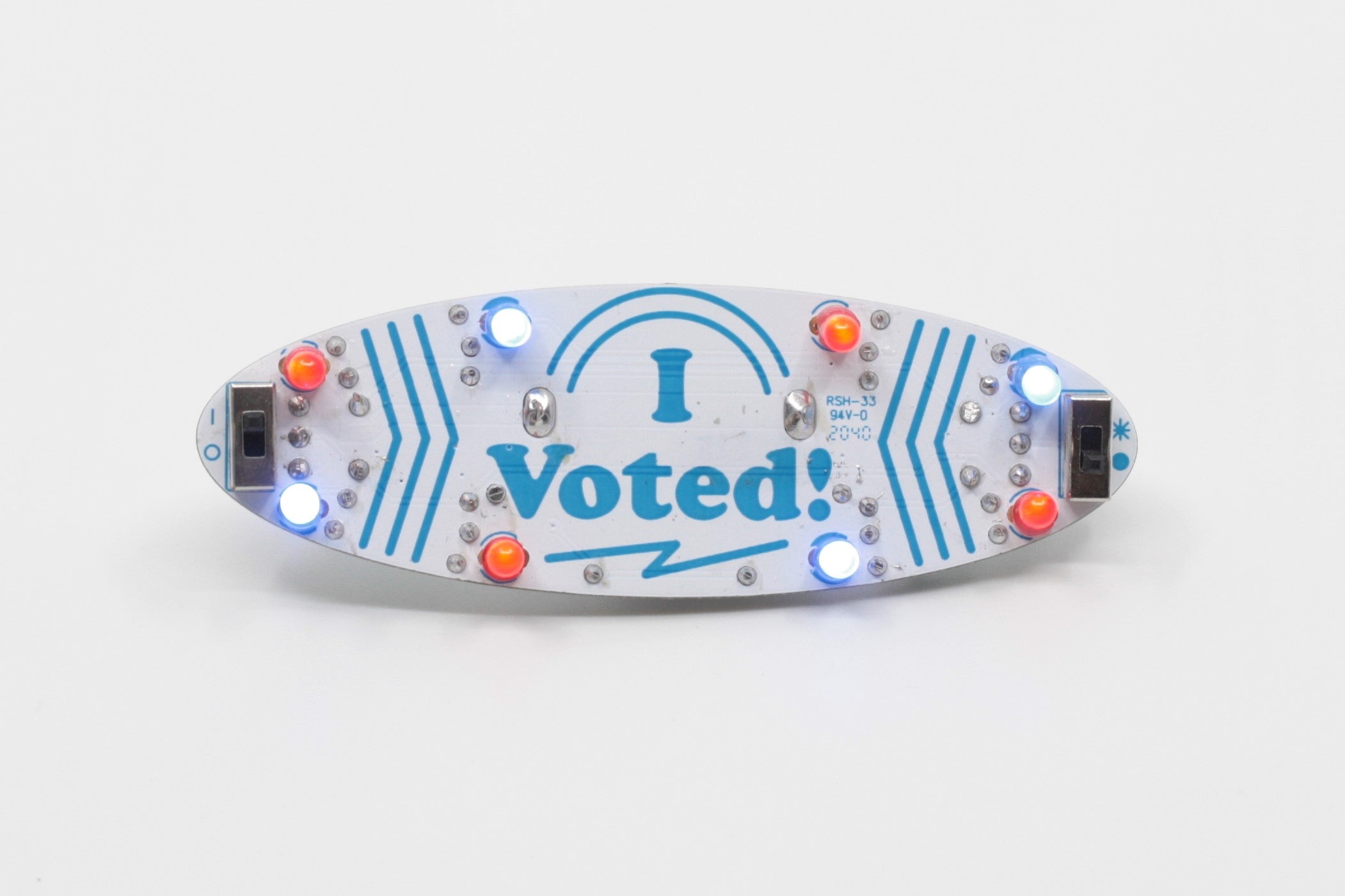 I Voted/Yo Voté Blinky Badge Soldering Kit